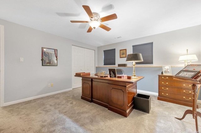 office featuring light colored carpet and ceiling fan