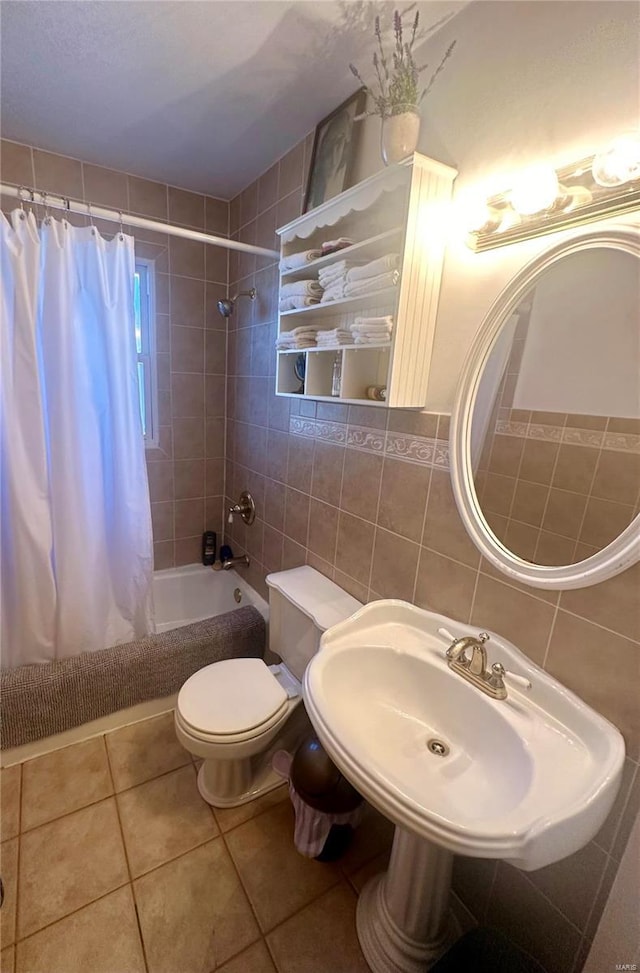 full bathroom featuring shower / bathtub combination with curtain, tile walls, tile patterned flooring, decorative backsplash, and toilet