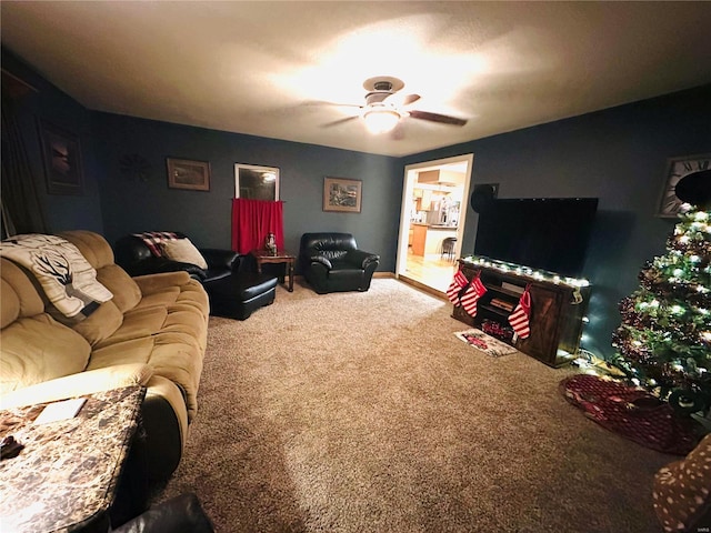 living room with carpet and ceiling fan