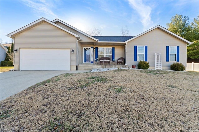 single story home featuring a garage and a porch