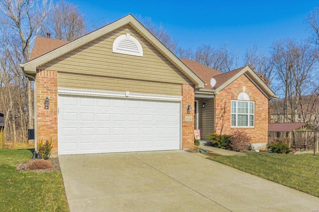 ranch-style home with a garage and a front yard