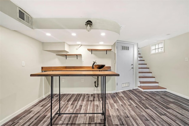 interior space with hardwood / wood-style flooring