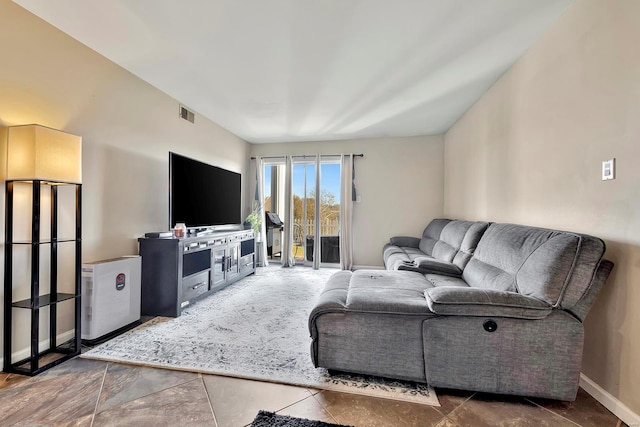 living room featuring tile patterned flooring