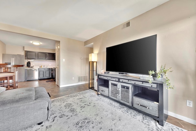 living room featuring sink