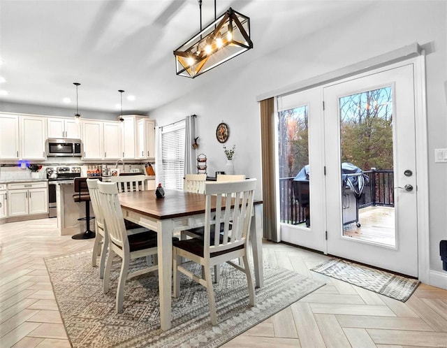 dining area with light parquet flooring