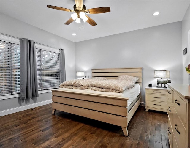 bedroom featuring ceiling fan and dark hardwood / wood-style flooring