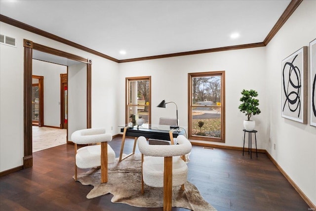 interior space with crown molding, baseboards, dark wood-style flooring, and visible vents