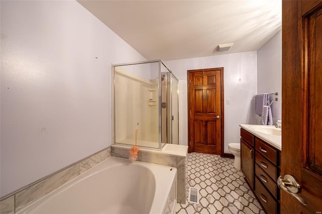 full bathroom featuring vanity, toilet, and shower with separate bathtub