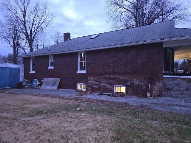 view of property exterior featuring a yard