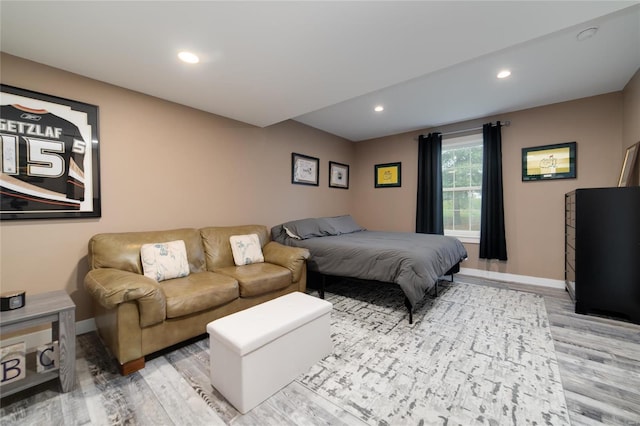 bedroom with light hardwood / wood-style flooring