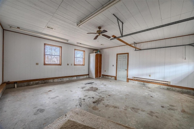 garage with baseboard heating