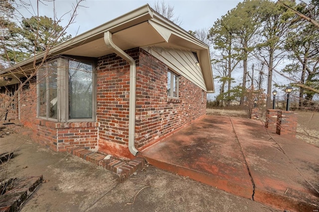 view of home's exterior featuring a patio