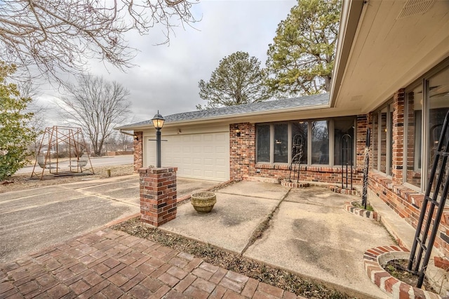 exterior space with a garage