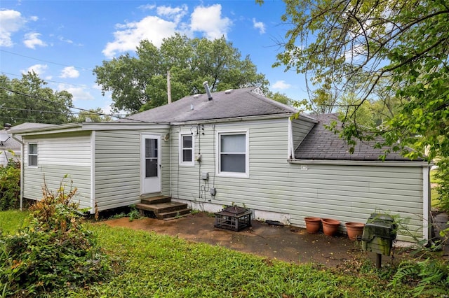 rear view of property with a patio area