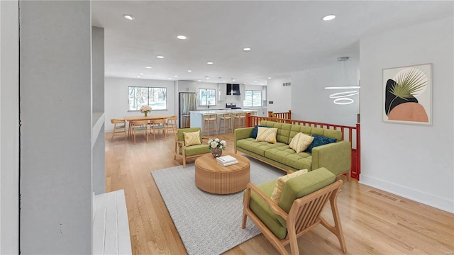 living room with light wood-type flooring