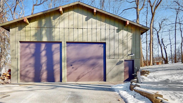 view of snow covered garage