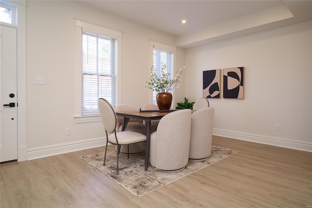 dining area with hardwood / wood-style floors