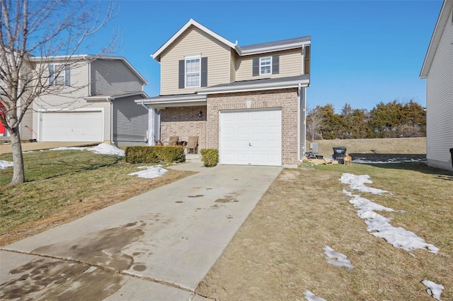 view of property with a garage and a front lawn