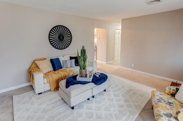 living room featuring light colored carpet