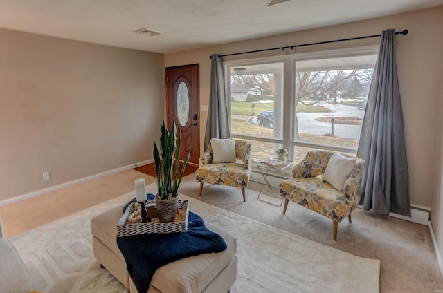 sitting room with light colored carpet