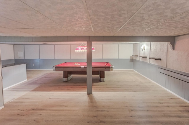 playroom with light wood-type flooring and billiards