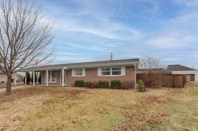 single story home with a front yard