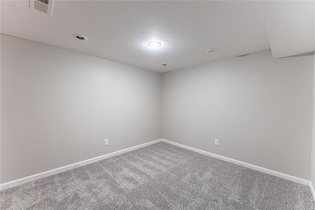 empty room with carpet floors