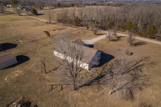 birds eye view of property featuring a rural view