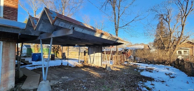 exterior space featuring a carport