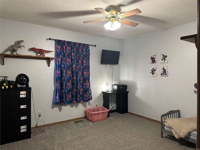 bedroom featuring baseboards, a textured ceiling, and carpet flooring