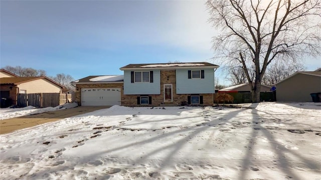 view of front of property featuring a garage