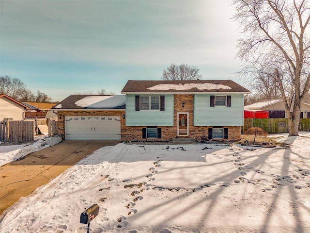 split foyer home featuring a garage