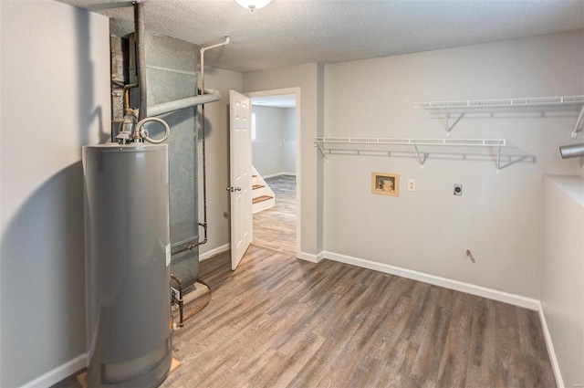 utility room with water heater