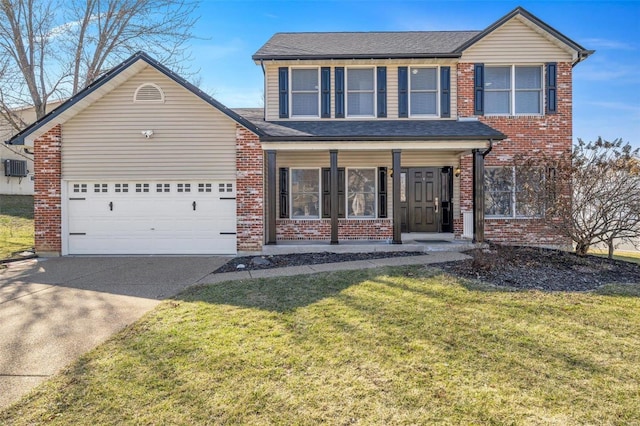 traditional home with driveway, an attached garage, covered porch, a front yard, and brick siding