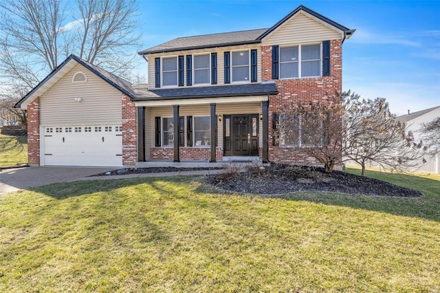 traditional-style home featuring a garage, a front yard, brick siding, and driveway