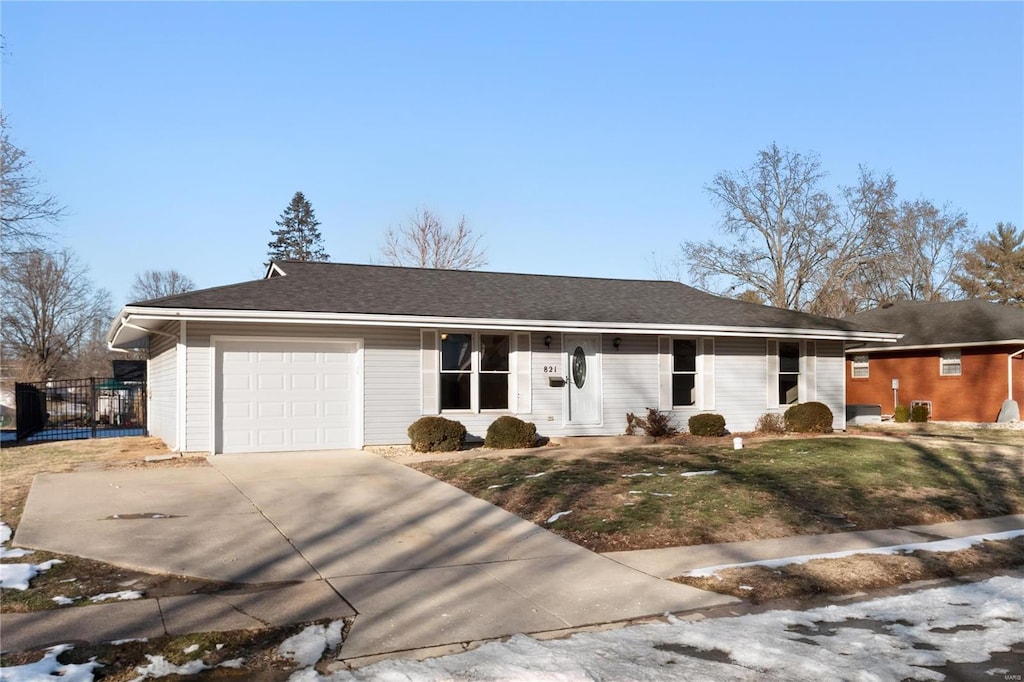 single story home featuring a garage