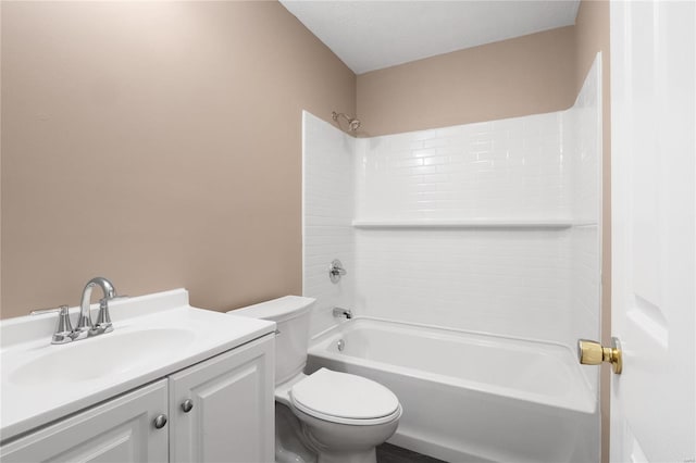 full bathroom featuring vanity, bathing tub / shower combination, and toilet