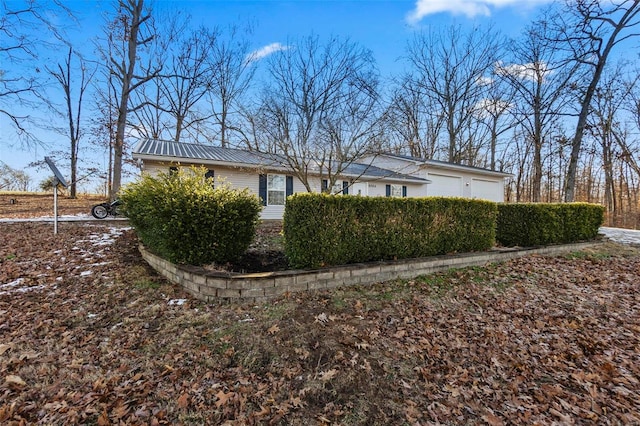 view of home's exterior with a garage