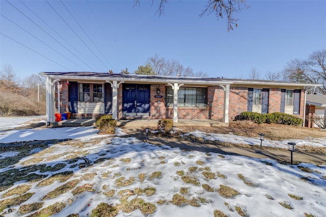 ranch-style house with covered porch