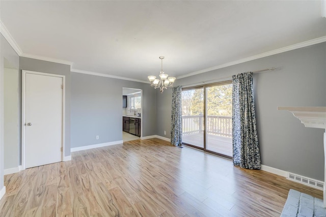 unfurnished living room with a notable chandelier, crown molding, light hardwood / wood-style flooring, and sink