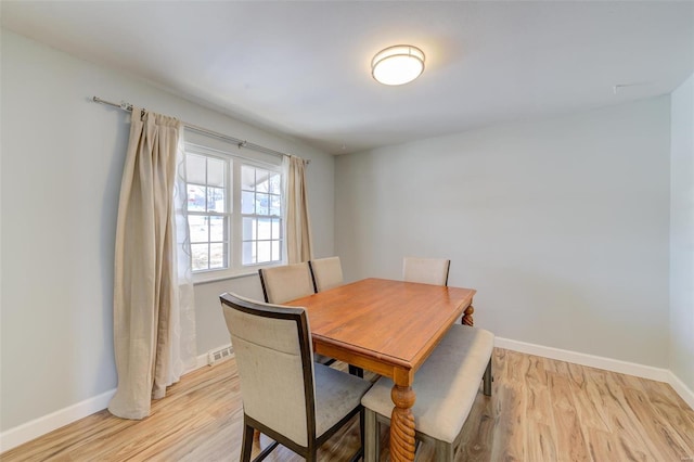 dining room featuring light wood-type flooring