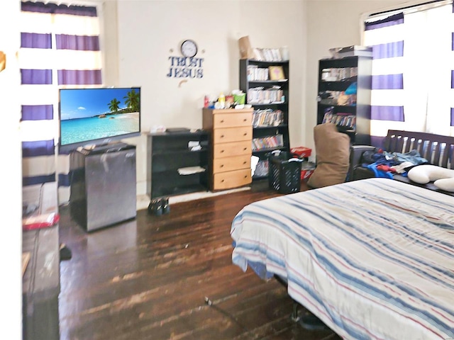 bedroom featuring dark hardwood / wood-style flooring