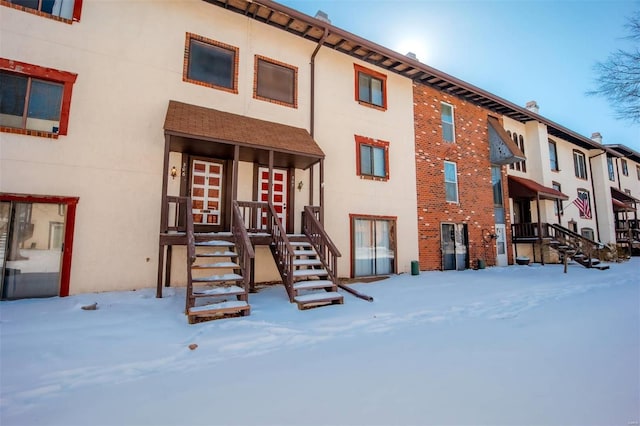 view of snow covered building