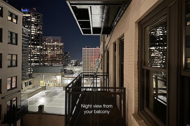 view of balcony at twilight