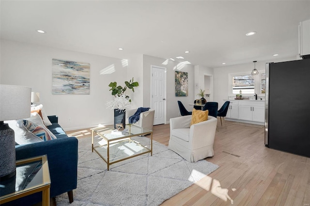 living room featuring light hardwood / wood-style floors