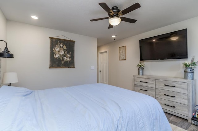 bedroom featuring ceiling fan and light wood-type flooring