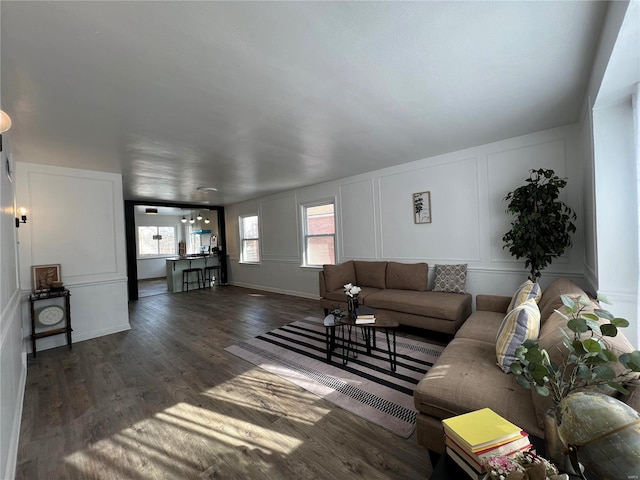 living room featuring dark hardwood / wood-style flooring