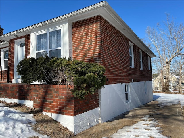 view of snow covered property