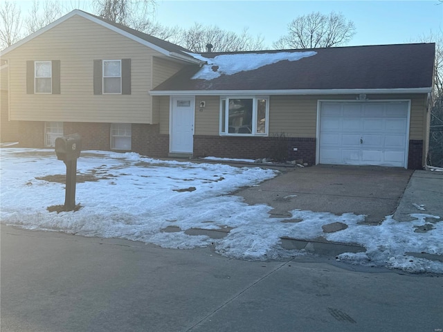 split level home with a garage