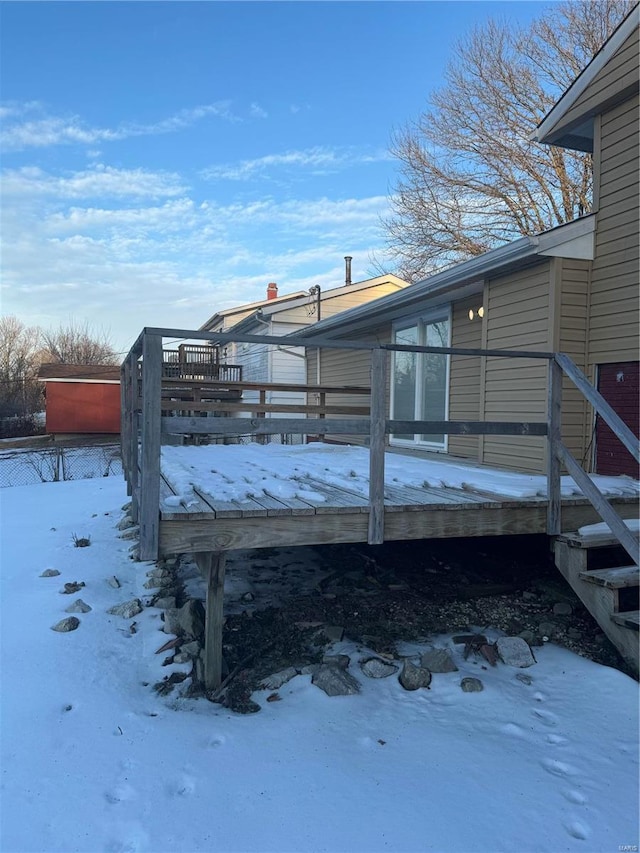 view of snow covered deck